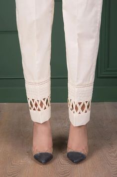 Beautiful pure cream cotton designer hand made lader trouser pant Full stitched product 🌺pair this trouser pant with crop top or tunic/shirt These loose fitting pant design is in trend right now 🌺This creates classic and elegant look that is easy to wear and will get noticed for sure 🌺Front belt Back elastic Flexible sizes Quality stitching NOTE: There might be slightly colour variation due to light and resolution and different colour settings. 🌺Please send me a message if you have any quest Cotton Straight Pant Set For Summer, Spring Cotton Pant Set, Cotton Pant Set With Chikankari Embroidery, Spring Cotton Trouser Sets, Spring Cotton Sets With Trousers, Fitted Summer Pant Set With Chikankari Embroidery, White Cotton Pant Set For Summer, Fitted Cream Cotton Pants, Beige Summer Sets With Straight Pants