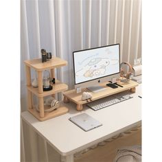 a desk with a computer, keyboard and mouse on it