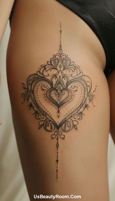 An ornate heart design with elaborate patterns, perfect for those who want a sophisticated and decorative thigh tattoo. Small Thigh Tattoo, Tattoos Trendy, Plus Size Tattoos, Thigh Tattoo Ideas, Trendy Tattoo Ideas, Small Thigh Tattoos, Chic Tattoo, Tattoos For Girls, Small Girl Tattoos