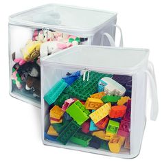 two clear storage containers filled with legos and toys