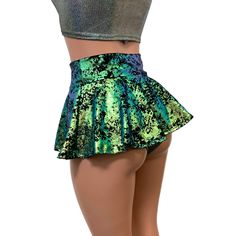 10" Super Mini Rave Skirt High Waisted Metallic Green on Black Gilded Velvet Handmade in the USA Stretch green on black gilded velvet high-waisted skater rave skirt. The shimmery fabric shines in the light and swings and twirls with movement. The skirt length is 10" from top to bottom - but if you'd like it shorter, please specify in the personalization box. Shown in photos with our high waist scrunch bikini in gleaming silver - sold separately in our shop. Dinosaur Rave Outfit, Rave Skirt Outfit, Hologram Skirt, Rave Outfits Skirts, Skater Skirt Outfit, Rave Outfits Women, Velvet Skater Skirt, Velvet Clothing, Rave Skirt