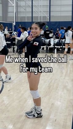 a girl in volleyball uniform standing on a court with the words me when i saved the ball for my team