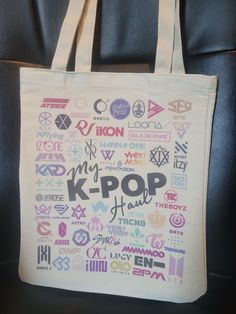 This tote is made of a cotton-polyester blend. Sublimation printed. Filled with the logos of many of K-pop's popular groups.   If there is a logo you don't see, let me know and a special version can be made. About the Design:   This is my own design, created by me.  Use of this design is copyrighted and prohibited without permission.  If you have any questions, please feel free to ask me. Returns/Exchanges: At this time, I cannot accept returns but would gladly offer an exchange.  Item must be r Kpop White Cotton Bag, White Cotton Kpop Style Bag, Stray Kids Outfits, Kpop Diy, Picnic Baskets, 17 Kpop, Funny Quotes For Instagram, Insulated Bags, Kpop Merch