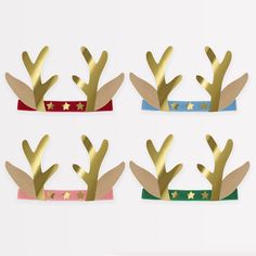 Why wear plain party hats when you, and your guests, can look reindeer remarkable in luxury velvet and gold foil? These fun antler headbands feature velvet elastic details, teamed with gold foil antlers and stars, and kraft paper ears. They're perfect for kids and adults. 8 Reindeer paper antler headbands with 4 different colored velvet elastic details – dusty pink, dark green, red and light blue The velvet elastic section comfortably fastens at the back with a hook and loop fastener 3 Gold foil 8 Reindeer, Christmas Headwear, Christmas Party Hats, Antler Headband, Reindeer Antlers, Calendar Gifts, Meri Meri, Christmas Party Supplies, Christmas Gift Decorations