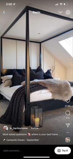 an instagram photo of a bedroom with a canopy bed in the middle and pillows on the bottom