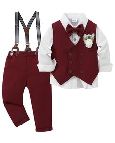 a little boy wearing a red suit and bow tie with suspenders, white shirt and pants