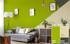 a living room filled with furniture and green paint color swatches on the walls,