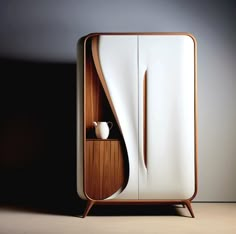 a white refrigerator freezer sitting next to a wooden shelf on top of a floor