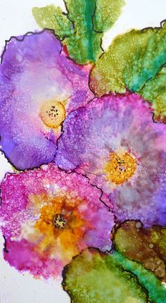 some very pretty flowers painted with watercolors on white paper and colored pencils