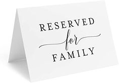 a white card with the words reserved for family on it