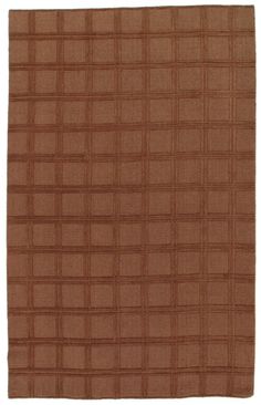 a brown rug with squares on it