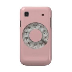 a pink phone case with an old fashioned dial