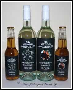 three bottles of wine with labels on them