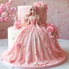 a pink cake with a barbie doll on top and flowers around the edges, sitting on a table