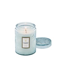 Notes of California Waves, Sea Salt, Warm Vanilla, Teakwood. About the Product: Sand And Fog Candles, Voluspa Candles, Waves Sea, California Summer, Into The Blue, Glass Jar Candles, Large Jar, Sling Chair, Small Jars