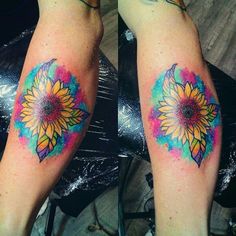 two colorful sunflowers on both legs