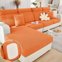 an orange and white couch in a living room