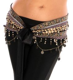 the belly belt is adorned with beads and tassels on it's waist