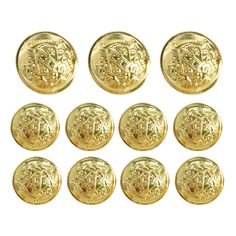 twelve gold buttons with the letter d on each one side and an image of a man's head in the middle