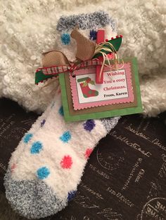 a christmas sock with a tag on it