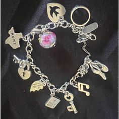 This Sterling Silver Charm Medium Bracelet (Approx 71/4 Inches) Is Made With A Special Twist. Add Your Personal Charm Collection And Let It Tell Your Life's Story. Great Condition * Lobster Clasp Closure * With 10 Charms Listed In Order 1. Ballet Shoes 2. Musical Note 3. Key 4. Bible 5. Half Of Friendship Heart 6. Heart With Key 7. Texas Map 8. Pink Flower Enamel 9. Heart With Dove 10. Crown James Avery Charm Bracelet, Medium Twist, Friendship Heart, James Avery Charms, James Avery Jewelry, Texas Map, Charm Collection, Sterling Silver Charm Bracelet, James Avery