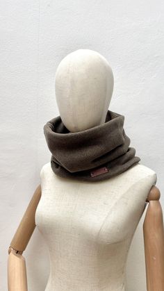 Stay cozy and stylish this winter with our Unisex Polar Cowl Neck Warmer. Made from soft and warm polar fleece, this short scarf is the perfect accessory to keep you warm during the cold months. The cowl neck design allows you to easily pull it over your head to protect your neck and face from the harsh winter winds. Whether you're out running errands or hitting the slopes, this versatile accessory is a must-have for your winter wardrobe. Available in a variety of colors to match any outfit, thi Warm Scarves For Outdoor Fall Use, Casual Warm Winter Scarves, Warm Casual Winter Scarves, Warm Casual Scarves For Outdoor, Casual Warm Scarves For Outdoor, Cozy Warm Solid Color Scarves, Cozy Warm Solid Color Scarf, Solid Color Winter Scarves One Size, Brown Wool Casual Scarf