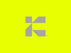 the letter e is made up of squares and rectangles on a yellow background