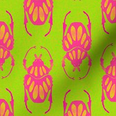 a green and pink wallpaper with an image of a bug in the center on it