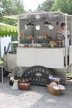 the food truck is selling baked goods for sale