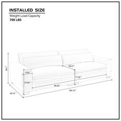 a white couch with measurements for it