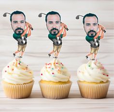 three cupcakes with the faces of two men playing golf