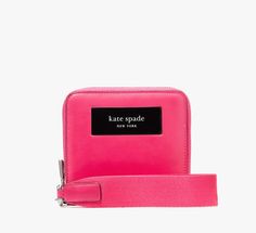 That's our name wear it out! Adorned with our bold leather label this compact webbed wallet stashes your essentials in style. | Kate Spade Label Small Compact Webbed Wristlet, Rosehip Kate Spade Small Wallet, Compact Kate Spade Wallet, Kate Spade Keychain Wallet, Pink Kate Spade Wallet, Key Chain Wallet, Black Kate Spade Wallet, Chain Wallet, Keychain Wallet, Leather Label