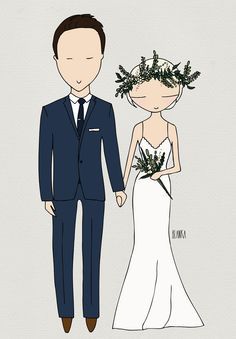 a bride and groom standing next to each other in front of a paper cutout