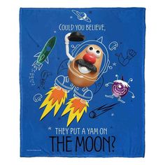 a blue towel with an image of a cartoon character on the back and words that say, could you believe, they put a yam on the moon?