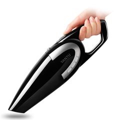 a woman's hand is holding an electric hair dryer in black and silver