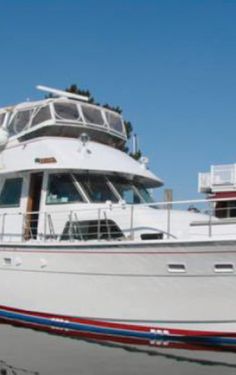 a large white boat sitting in the water