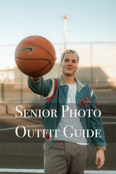 a man holding a basketball in his right hand with the words senior photo outlet guide above it