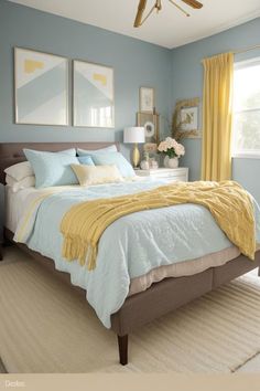 a bedroom with blue walls and yellow drapes