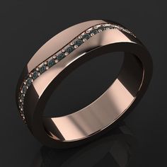 a rose gold ring with blue and white diamonds in the center on a black background