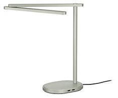 a white desk lamp with a dim light on it's side and a cord attached to the base