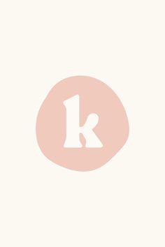 the letter k is shown in white on a light pink background with an oval shape