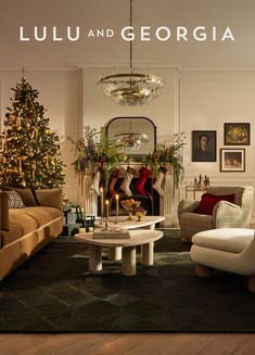 a living room filled with furniture and a christmas tree