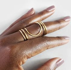 Nandi | Gold Ring - Baluku Design Cheap Silver Brass Rings, Luxury Minimalist Hand Forged Stackable Rings, Luxury Symbolic Brass Rings, Luxury Elegant Brass Rings, Luxury Brass Rings With Polished Finish, Luxury Polished Brass Rings, Finger Splint, Full Finger Rings, Metal Jewellery