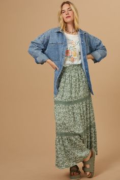 Embrace bohemian style with this flowy floral maxi skirt. The delicate floral print adds a touch of femininity and romance, while the smocked elastic waistband ensures a comfortable and flattering fit. The intricate lace details add a touch of luxury and make this skirt perfect for any occasion. Floral Dresses Outfit, Long Fall Skirts, Edgy Floral Outfits, Cardigan With Maxi Skirt, Casual Outfits With Long Skirts, Flowy Feminine Style, Patterned Maxi Skirt, Modest Bohemian Outfits, Dress With Shacket