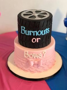 a three tiered cake with the words burnout's or bows on it