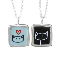 Cats cats cats!  A white drawing of a cat on black on one side and a drawing of a cat on light blue on the other.This sterling silver and enamel necklace measures about 3/4 of an inch tall and hangs from a sterling silver chain with a spring ring clasp.Each piece is cast in sterling silver, to which 3 layers of vitreous enamel are applied and fired. Finally, I apply and fire the custom screen prints made from my drawings. Adorable, durable, and unique!Look for the matching earrings:https://www.e Matching Things, Drawing Of A Cat, Matching Stuff, Matching Pendants, Black Cat Necklace, Custom Cast, Kitty Necklace, Vitreous Enamel, Custom Screen Printing