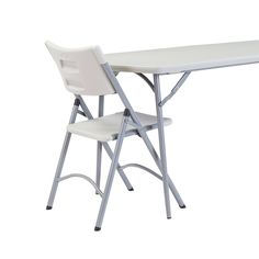 a white folding table with two chairs next to it