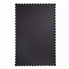 a black mat with scalloped edges is shown on a white background for use as a backdrop or wallpaper