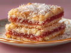 three pieces of dessert sitting on top of a plate