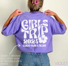 Get our custom girl's trip shirts for your upcoming Cabo San Lucas trip! Personalize location if needed in personalization box! Please message us if you have any questions, please message us! **UNISEX T-SHIRTS- Run true to size.  If wanting a more oversized look, selecting 2 sizes up is recommended. **CUSTOMIZATION-If you would like this design in a different color or on a different item (t-shirt, sweatshirt, tank top, bag, hat, etc.)-please message us and we will do our very best to get it made Trip Shirts, Cute Graphic Print T-shirt For Vacation, Purple Tops With Custom Print For Summer, Trendy Beach Vacation Shirt, Vacation Tshirt Ideas, Girls Beach Trip Shirts, Trendy T-shirt For Beach Party Vacation, Group Vacation Shirts, Beach Vacation Custom Print T-shirt